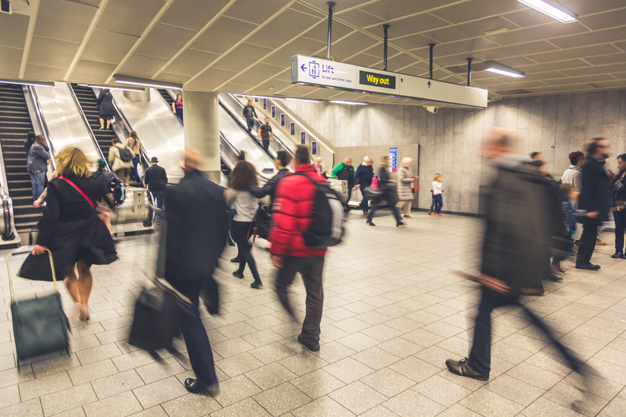 blurred-people-commuting-tube